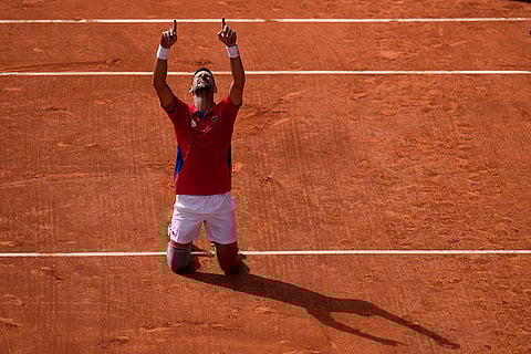 Serbia's Novak Djokovic celebrates gold in tennis singles final